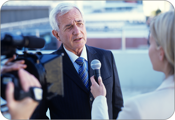 A corporate person facing media. Crisis Management Consultant